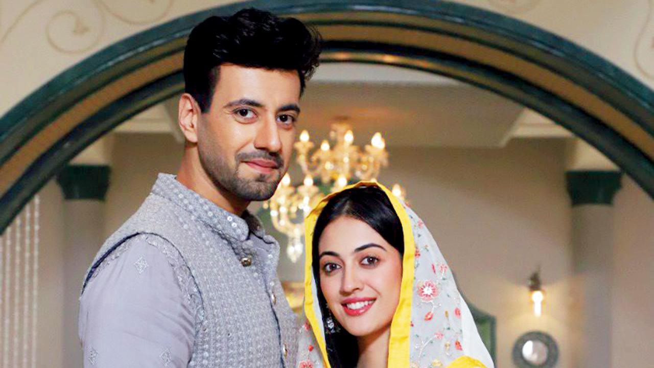 કરણવીર શર્મા અને અદિતિ શર્મા