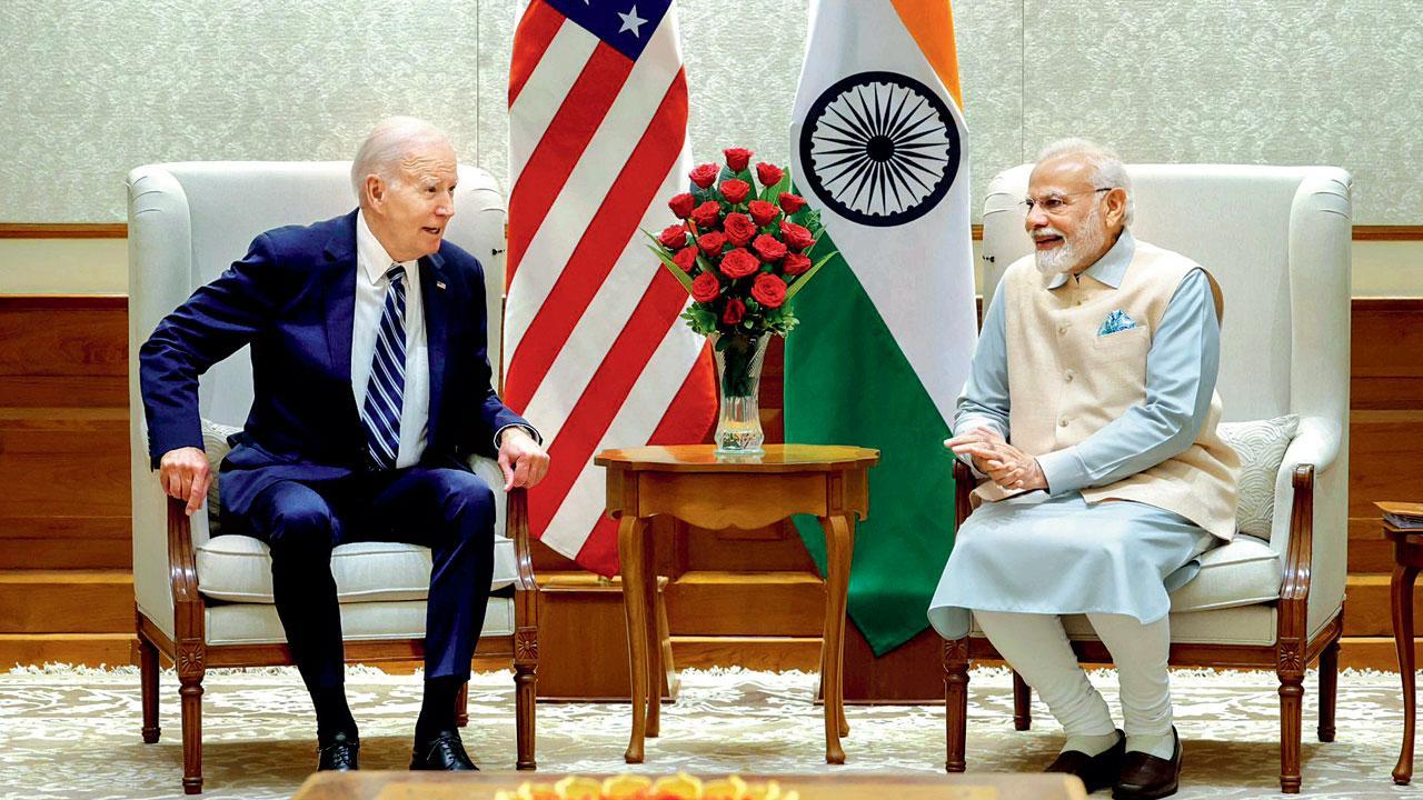 નવી દિલ્હીમાં ગઈ કાલે યુએસ પ્રેસિડન્ટ જો બાઇડનની સાથે મીટિંગ દરમ્યાન પીએમ મોદી.  પી.ટી.આઇ.