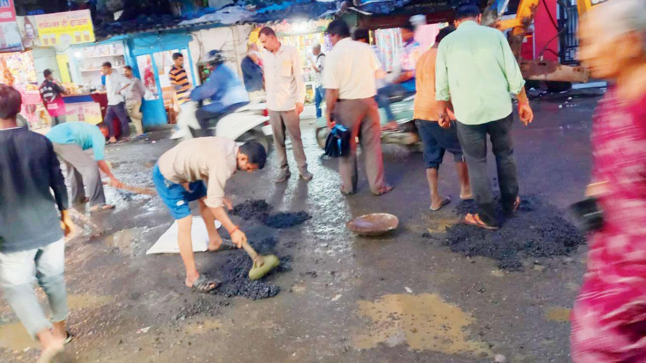 હેમુ કાલાણી રોડ પર ઠક્કર પ્લાઝા બિલ્ડિંગ સામે પડેલા ખાડા
