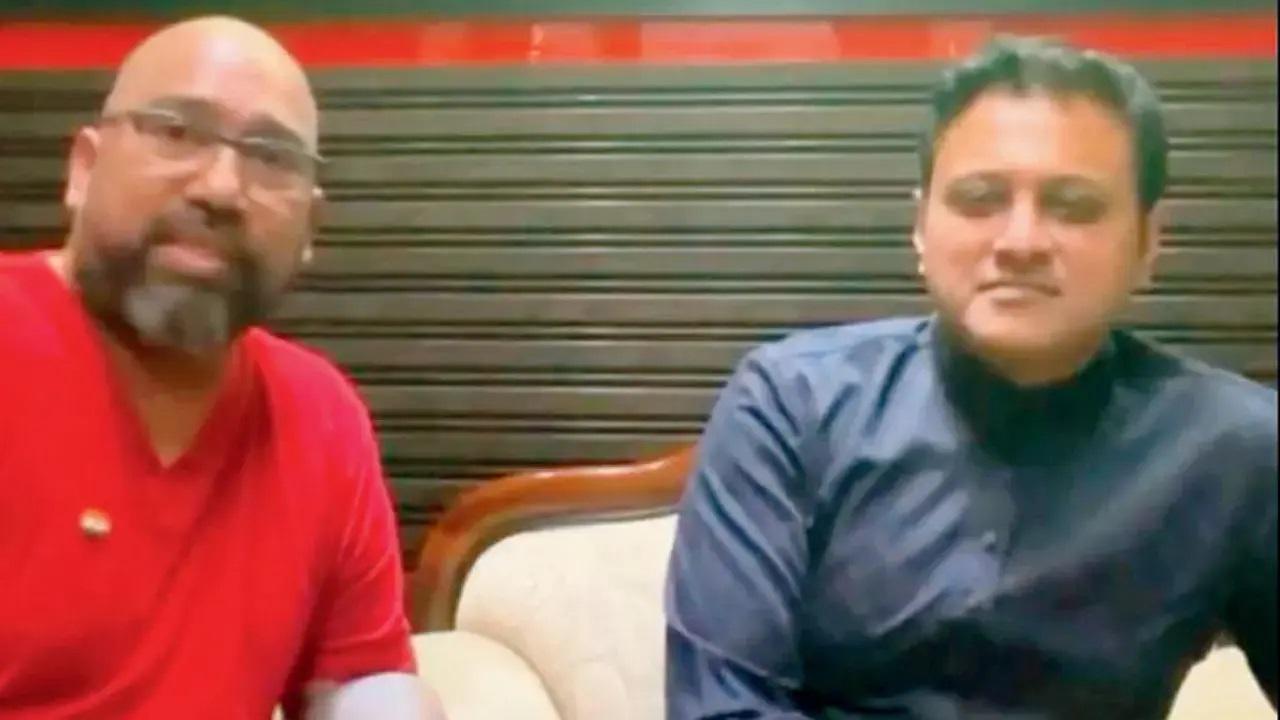 અભિષેક ઘોસાળકર અને મૉરિસ