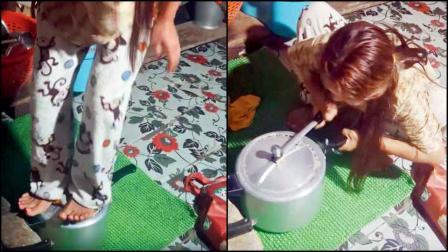 ઢાંકણું ન ખૂલ્યું તો બહેન ચડી ગયાં કુકરની ઉપર