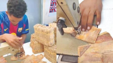 નવી નોટો છપાતી ન હોવાથી ફાટેલી નોટો દરજી પાસે રફુ કરાવી ફરી વપરાય છે સોમાલિયામાં