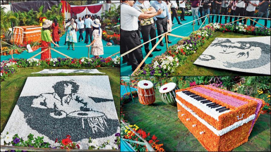 ફૂલોથી બનેલાં સંગીતનાં વિવિધ વાદ્યો અને પતંગિયું. તસવીરો : સૈયદ સમીર અબેદી