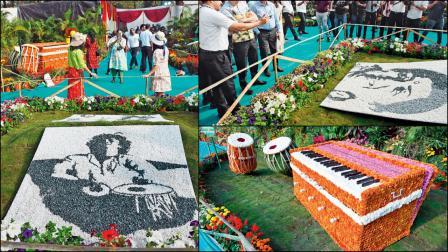 ફૂલોથી બનેલાં સંગીતનાં વિવિધ વાદ્યો અને પતંગિયું. તસવીરો : સૈયદ સમીર અબેદી