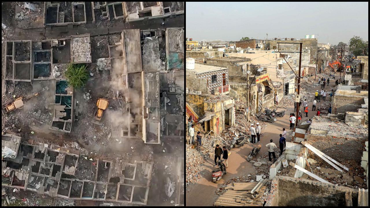 રાજકોટના જંગલેશ્વર વિસ્તારમાં આજી નદી કિનારે અને ટીપી રોડ પર ગેરકાયદેસર મકાનો તોડી પાડવાની ઝુંબેશ ચાલી રહી છે ત્યારે મોટી સંખ્યામાં લોકો એકઠા થયા હતા. (તસવીરો: એજન્સી)