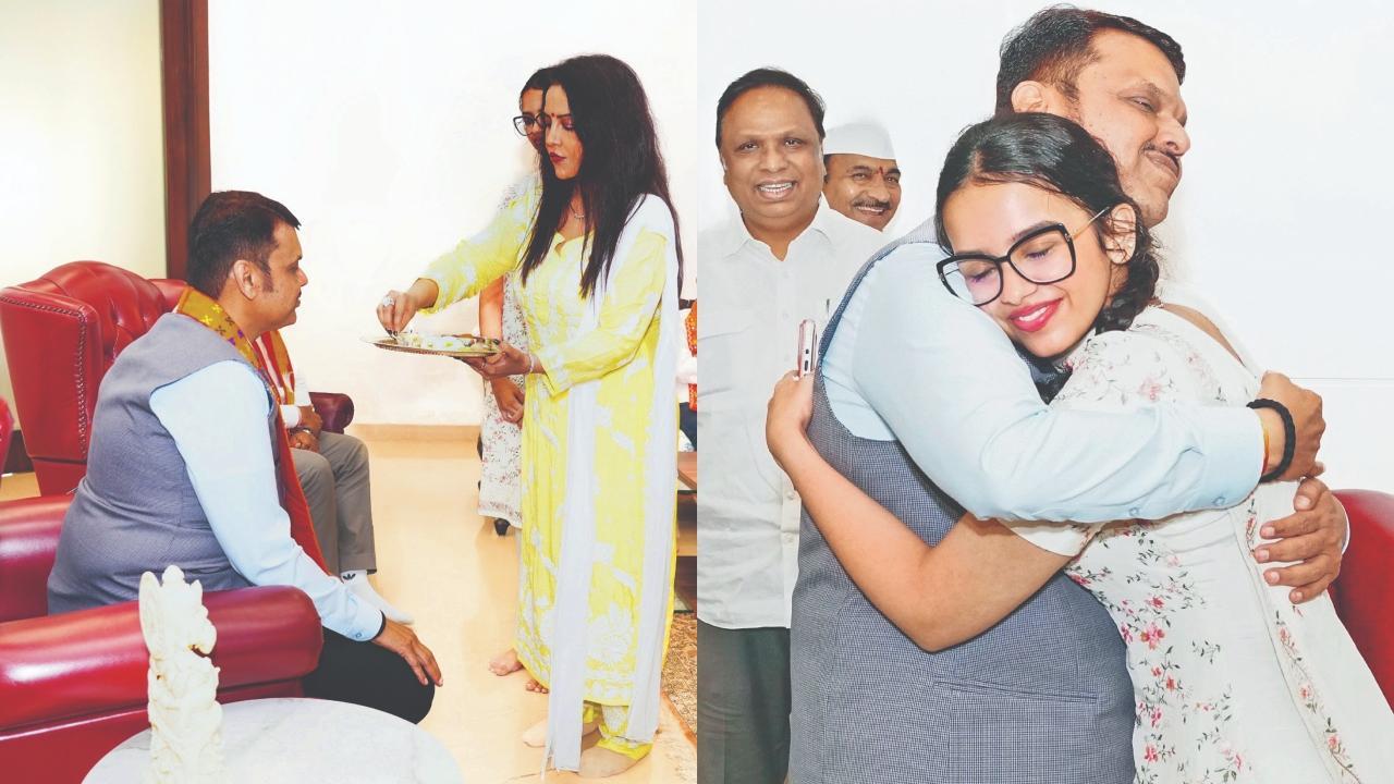 ગઈ કાલે દેવેન્દ્ર ફડણવીસની આરતી ઉતારતાં તેમનાં પત્ની અમૃતા અને પપ્પાને ભેટી પડેલી દીકરી