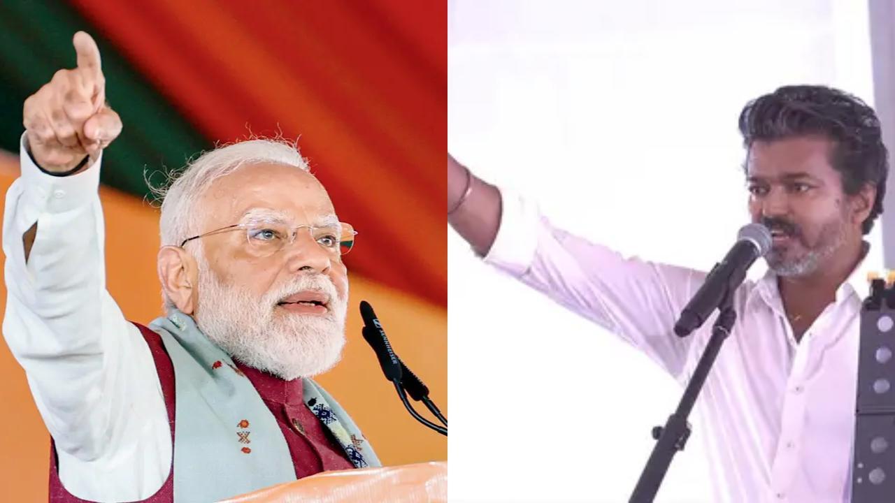 વડા પ્રધાન નરેન્દ્ર મોદી અને વિજય