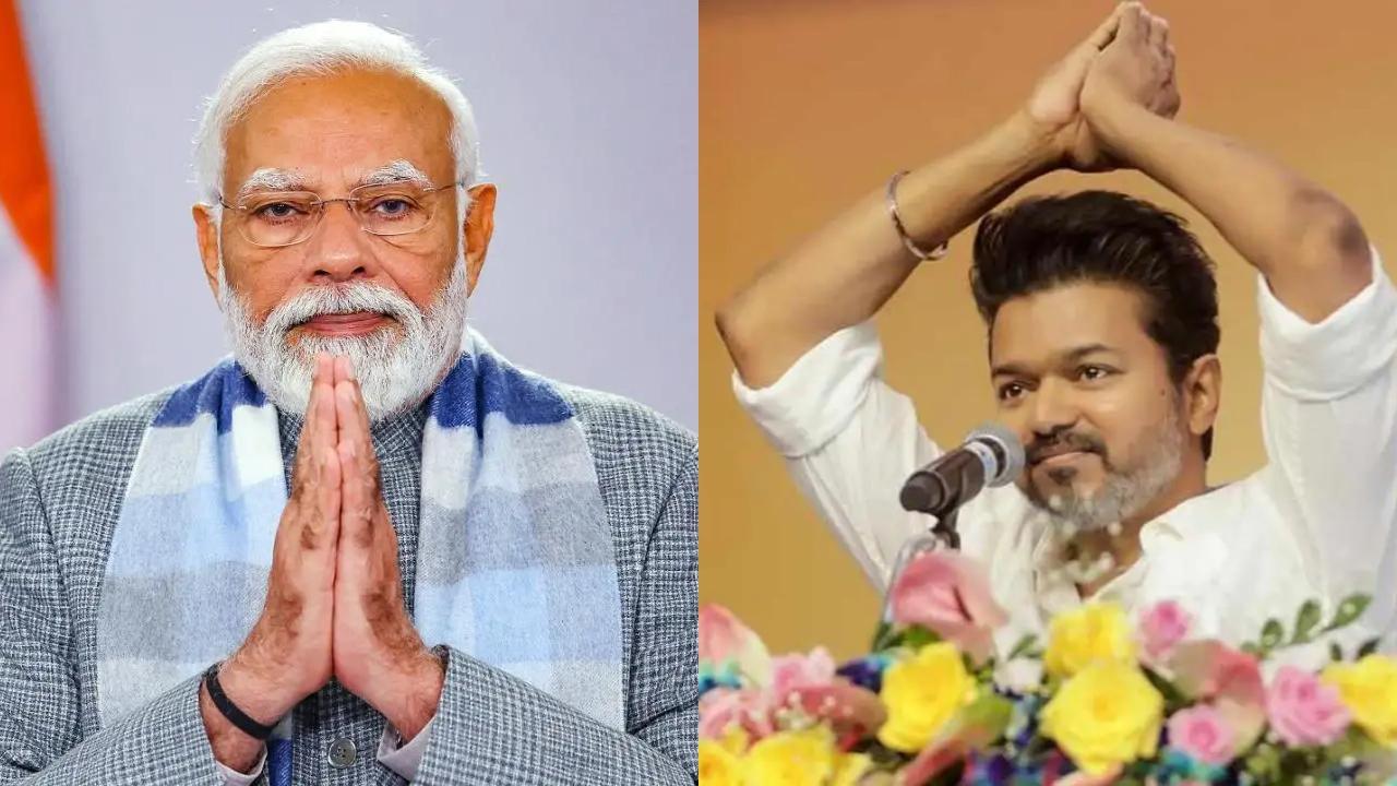 વડા પ્રધાન નરેન્દ્ર મોદી અને વિજય