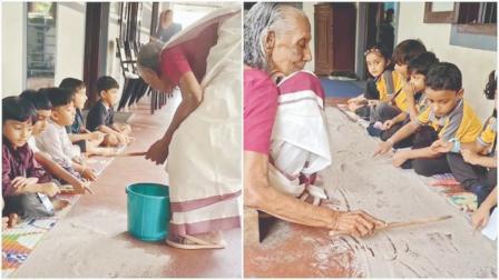 રેતી પર ભણાવતાં કેરળનાં શિક્ષિકા